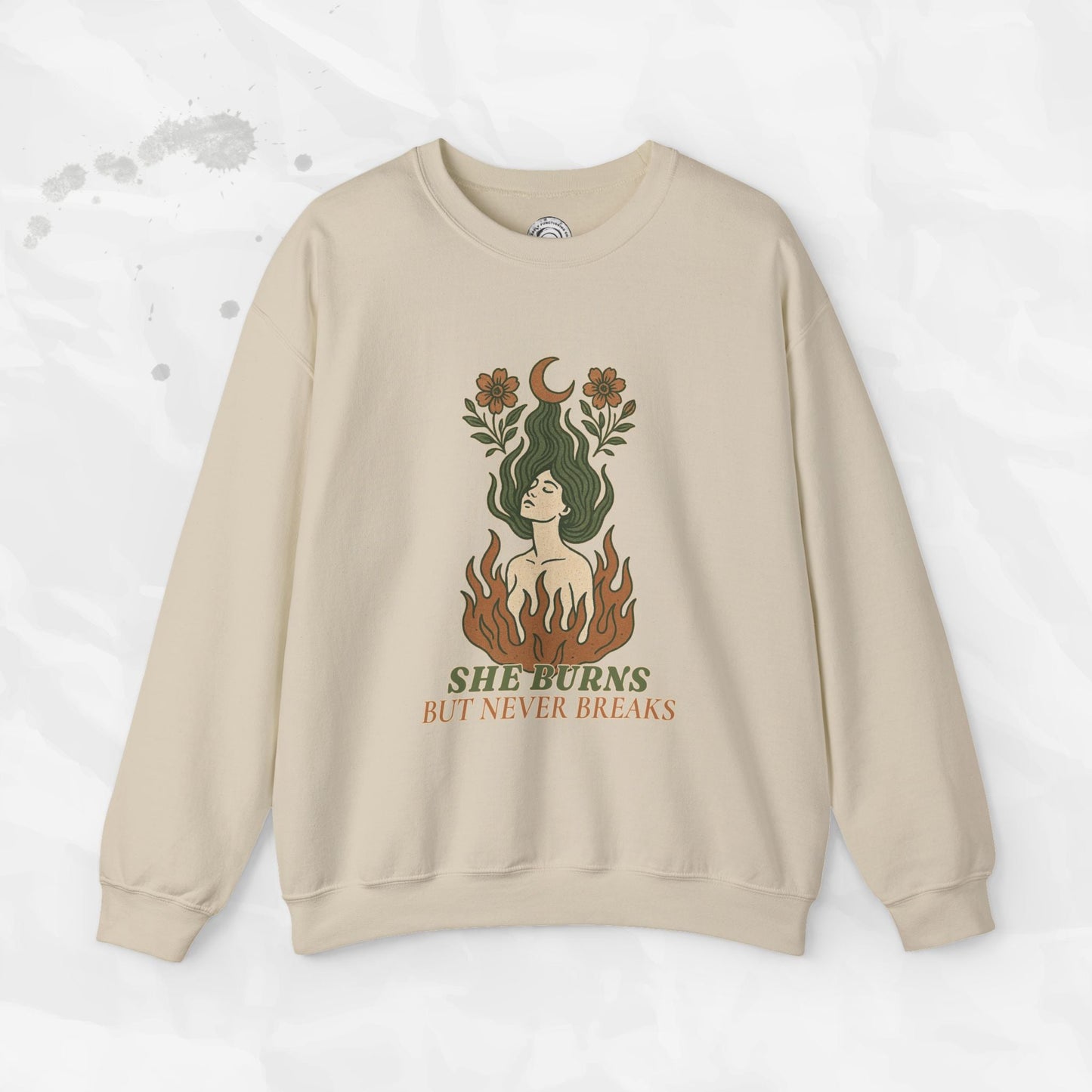 She Burns But Never Breaks – Crewneck Sweatshirt