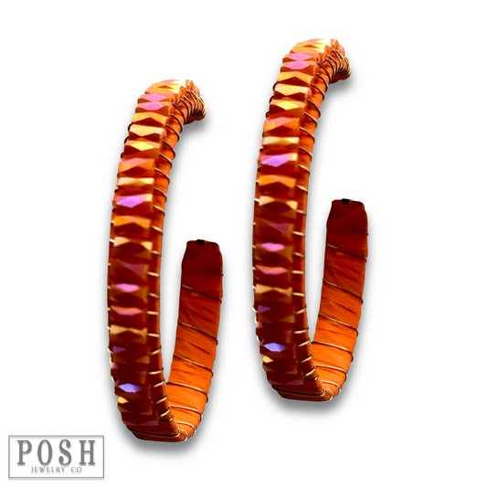 Hoop earring with wrapped crystal beads